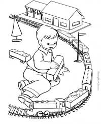 Ребенок играющий с тгрушечным поездом Распечатать раскраски для мальчиков